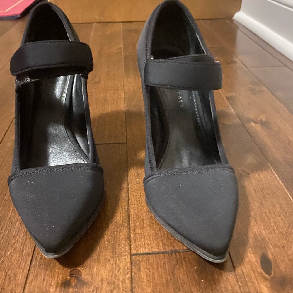 Funky cloth shoes done up with Velcro strap